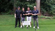 The ROSS team (left) pose for a photo with our golf partners and clients from Depend-A-Dor (right).
